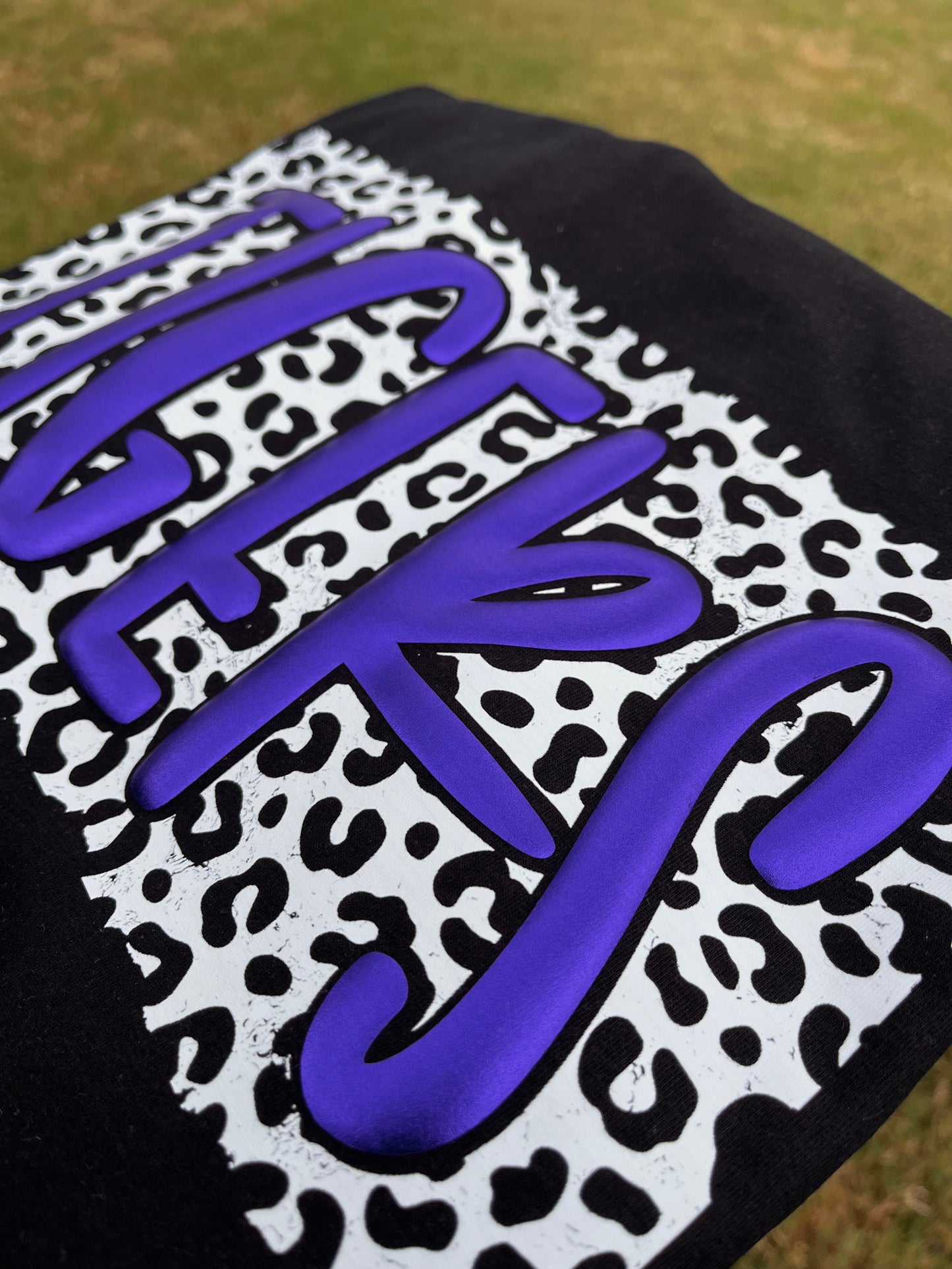 STAR OR LEOPARD BANNER MASCOT